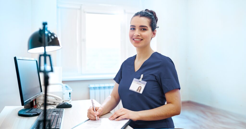 Medical Office Assistant working in a professional medical office setting.